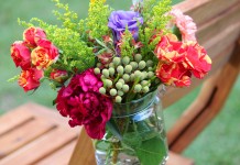 Hanging jars with flowers closeup