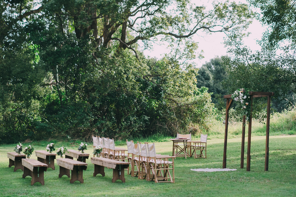 Byron Bay Wedding Ceremony at Ewingsdale Hall.  Furniture by Lovestruck Weddings.