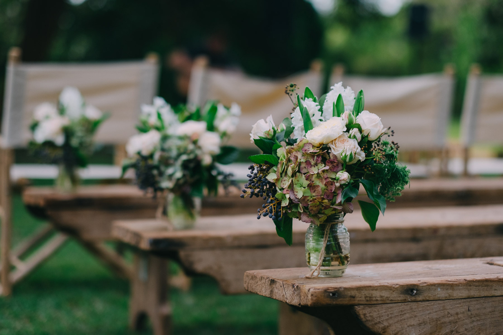 Byron Bay Wedding Ceremony at Ewingsdale Hall.  Furniture by Lovestruck Weddings.